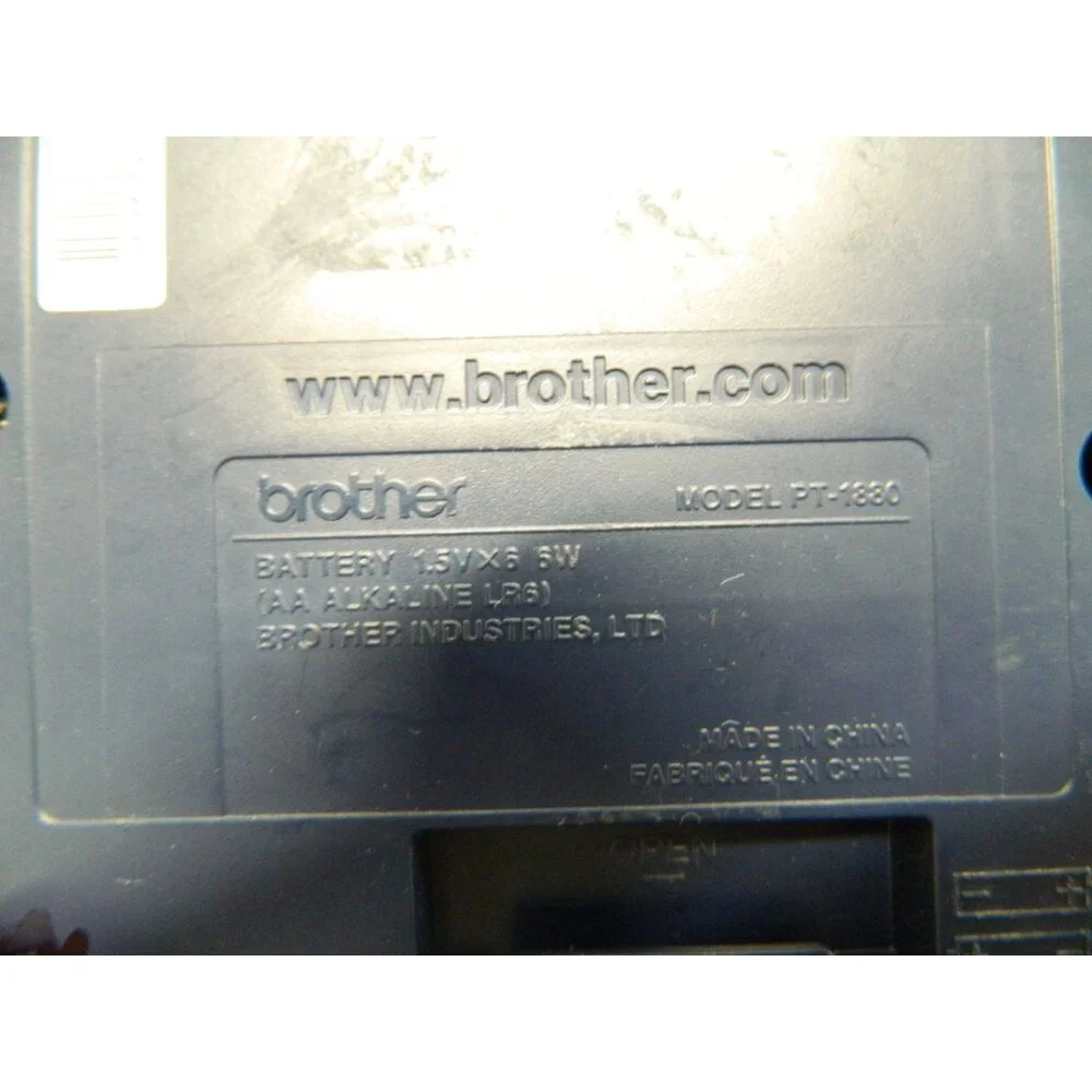 Brother P-Touch PT-1880 Label Maker With 12MM White Tape